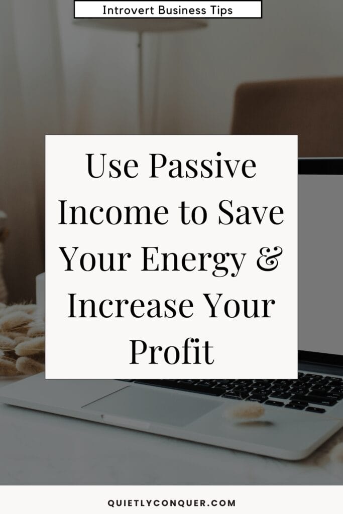A white open laptop on a desk with the text "Use Passive Income to Save Your Energy & Increase Your Profit" in front