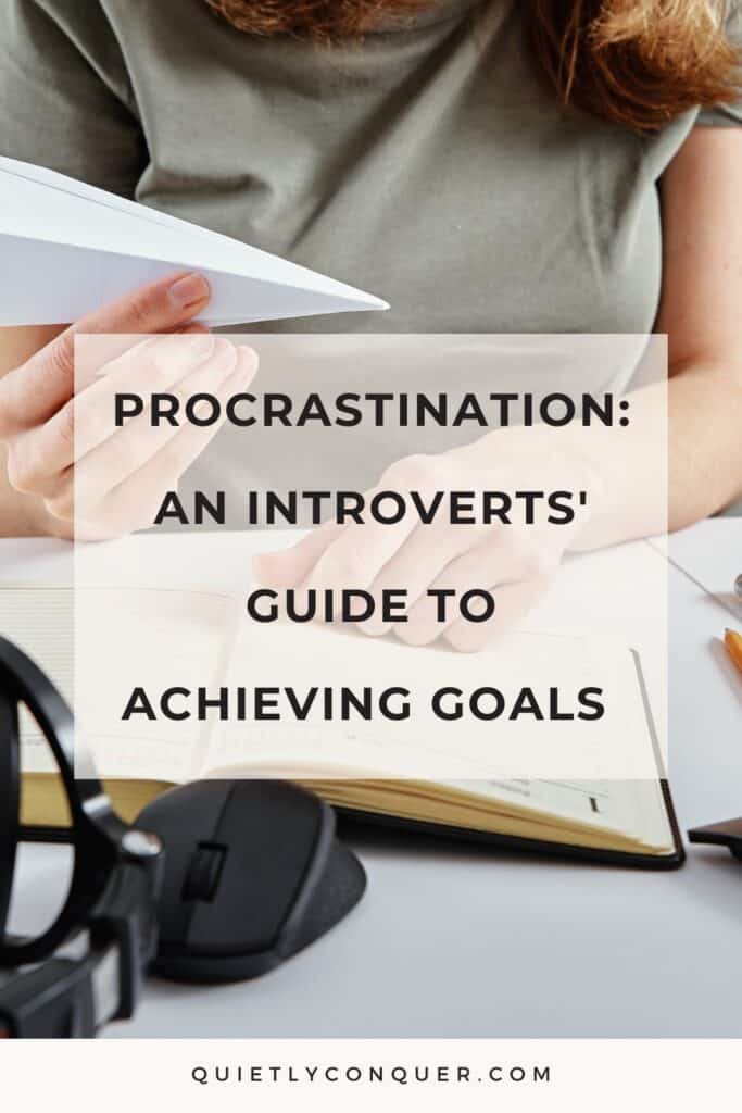 Woman at desk holding paper airplane. Highlighting Procrastination tips for introverts