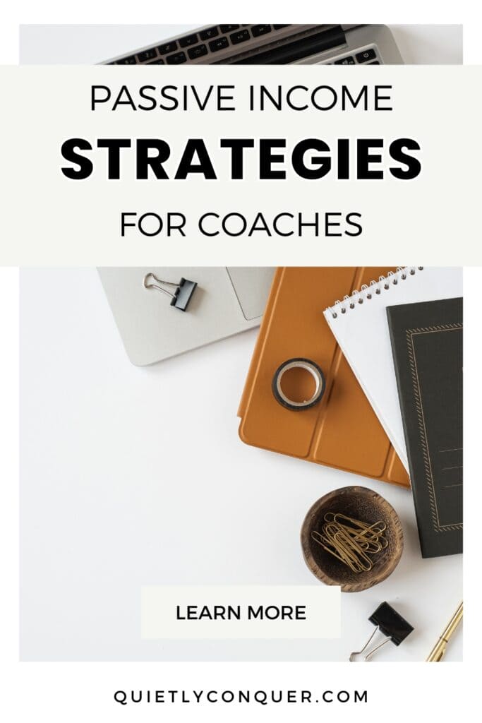 Passive Income Strategies for Coaches - image of a book, laptop and stationery on a desk