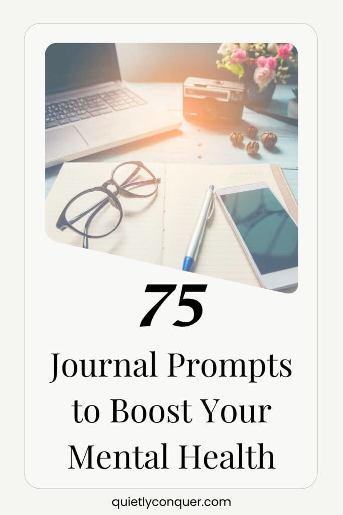 A faded image of an open journal with glasses and a mobile on it. The text 75 Journal prompts to boost your mental health at the bottom