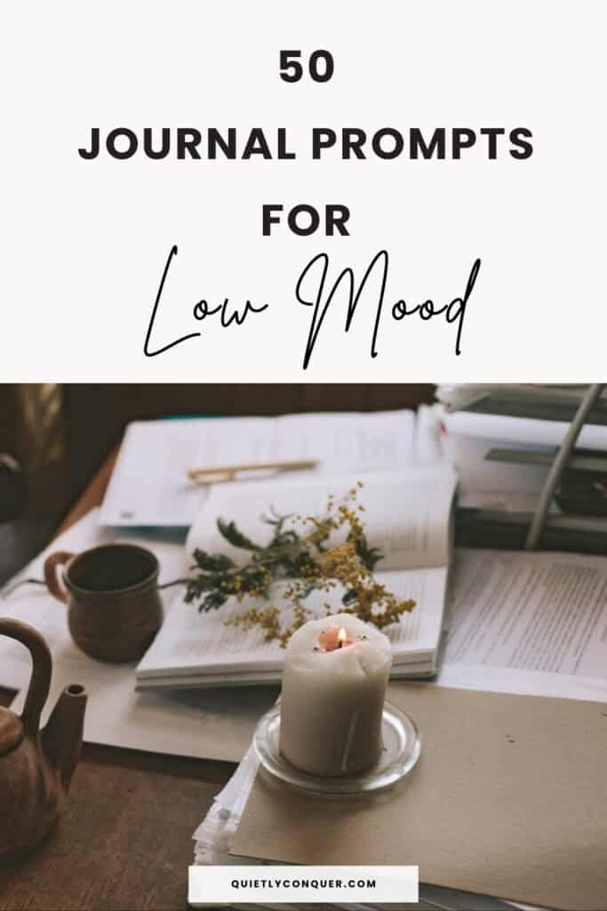 50 Journal Prompts for Low Mood written at the top, with image of an open journal with candle & flowers below