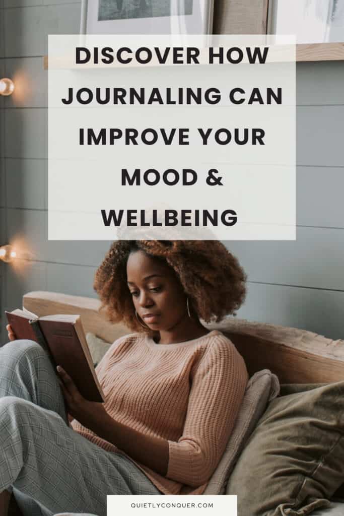 Woman sat on bed writing. Text reads - Discover How Journaling Can Improve Your Mood & Wellbeing. For journal prompts for low mood blog post.