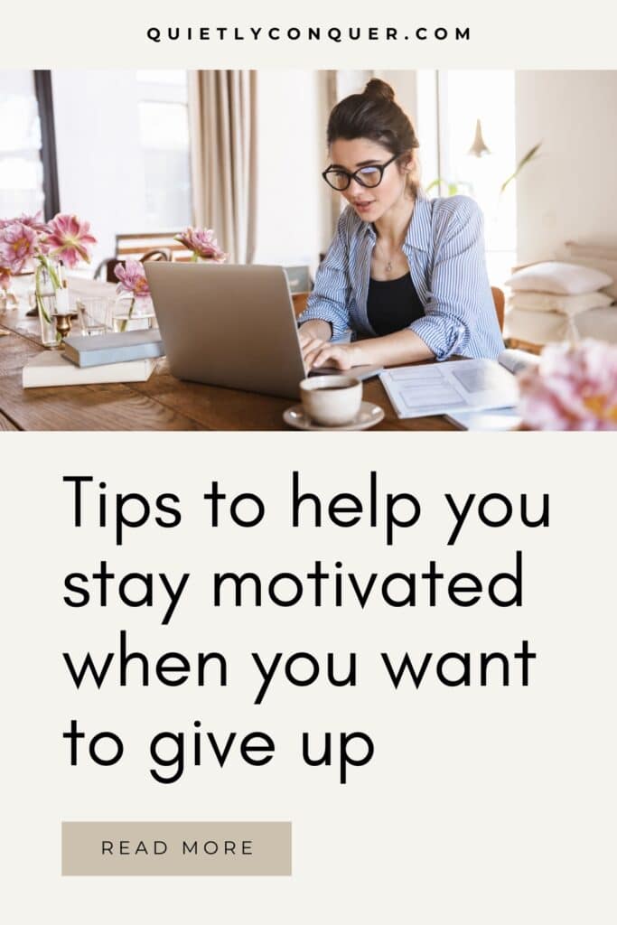Woman working at desk. Text below reads Tips to Help You Stay Motivated When You Want to Give Up