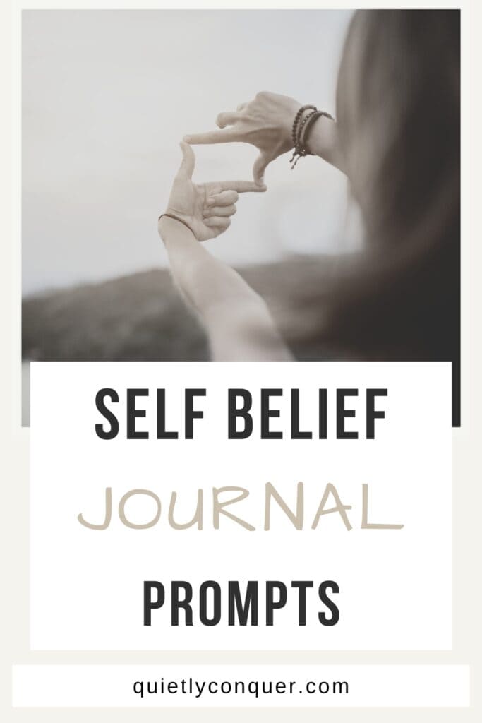 Self Belief Journal Prompts - Image of woman holding her fingers in diamond shape to the sky,