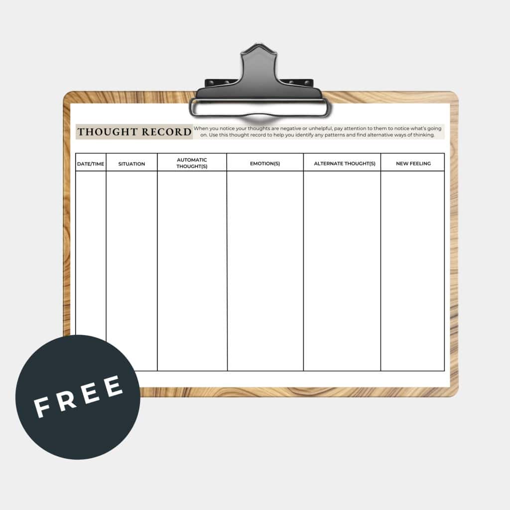 Thought Record: Mock up of the worksheet on a brown clipboard, with "FREE" written inside a black circle. 